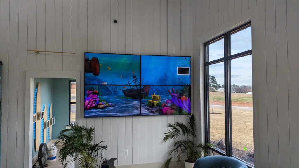 Modern living room with wall-mounted TV and hidden cables